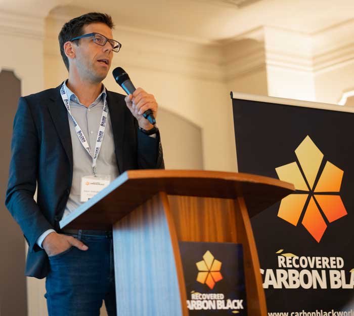 Robert Weibold speaking at Recovered Carbon Black conference in Berlin
